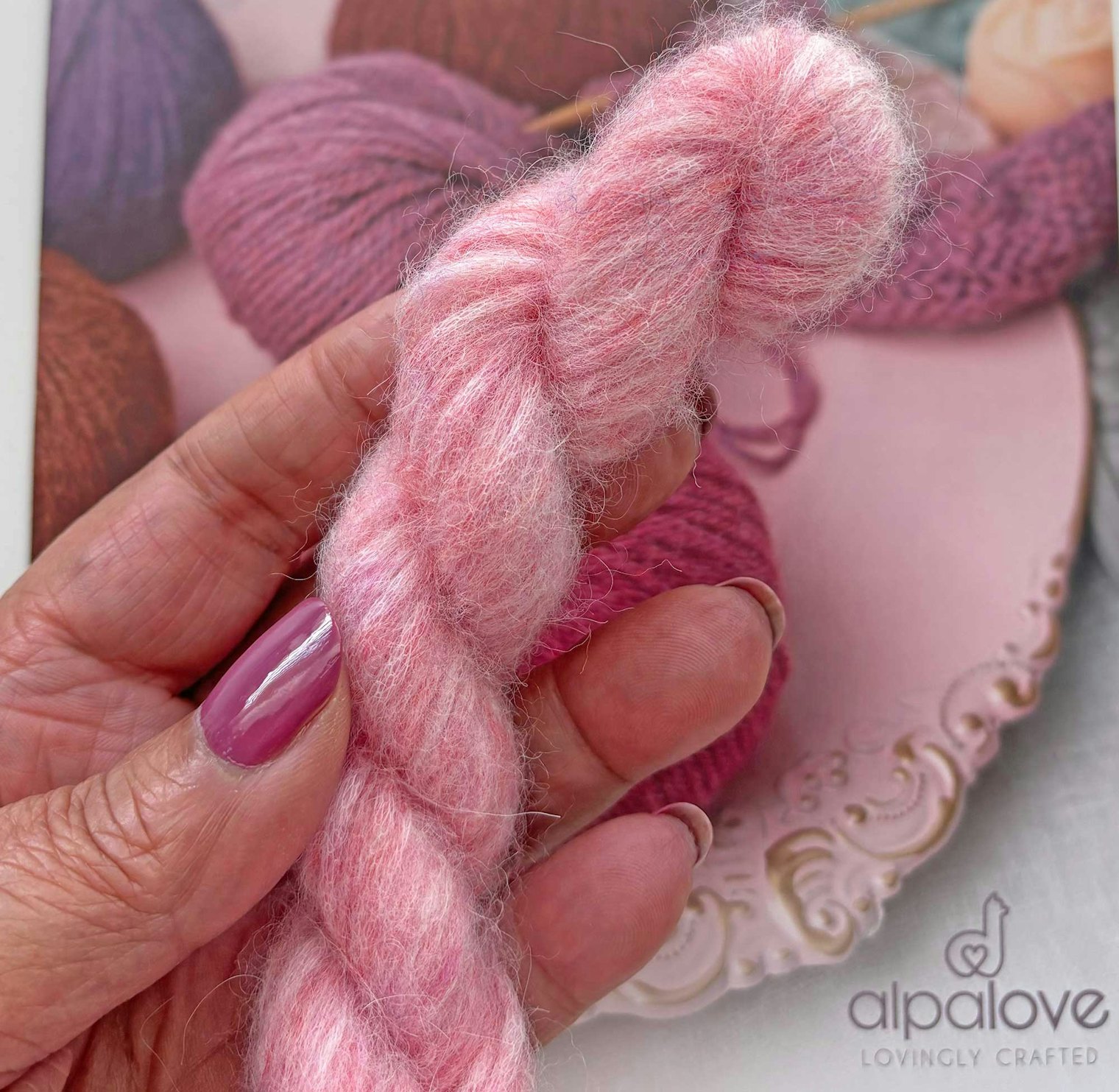 A sample-size skein of Alpalove Super Air Worsted.