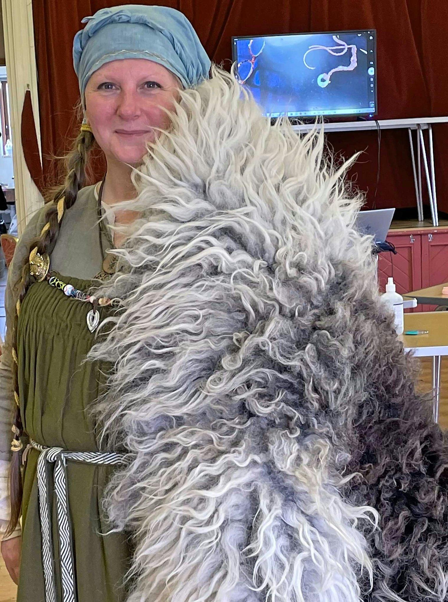 Helen says of her rugs: “I make these beautiful rugs only from the fleece of the sheep once it’s shorn and the sheep continues to live a happy, sheep life.” Photo by Cricket Cooper