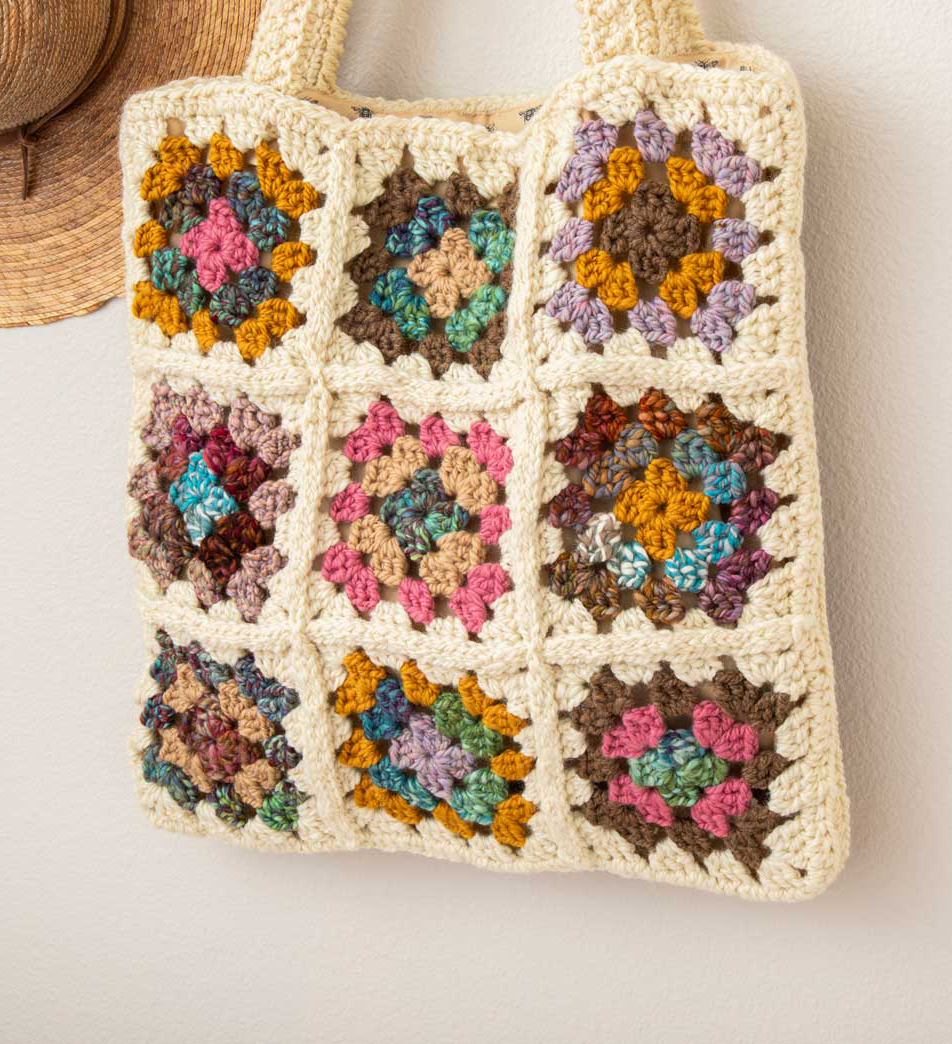 Crochet a granny square bag using handspun or commercial yarn.