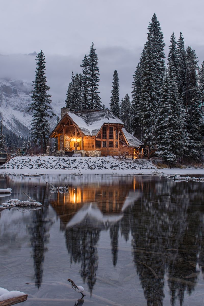 A view of cabin beside the lake.