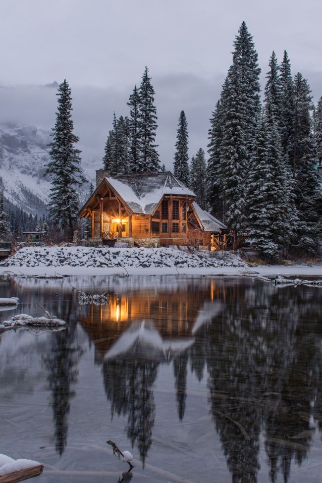 A view of cabin beside the lake.