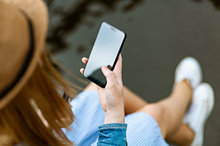 Woman on phone about to Call 911