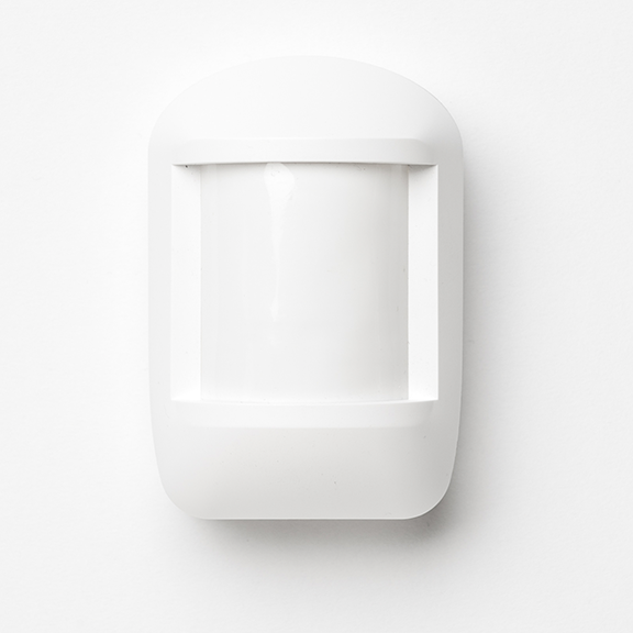 Cove's white motion sensor on a white background.