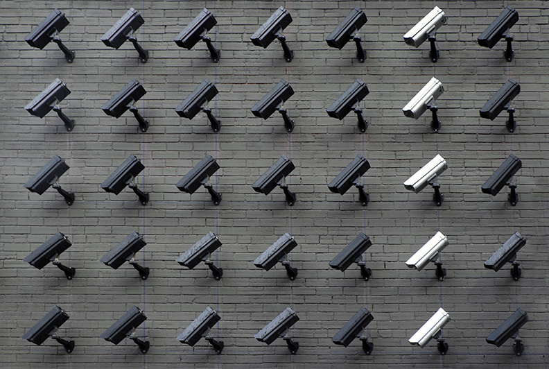 Wall of 1080p Security cameras of various colors all facing in one direction.