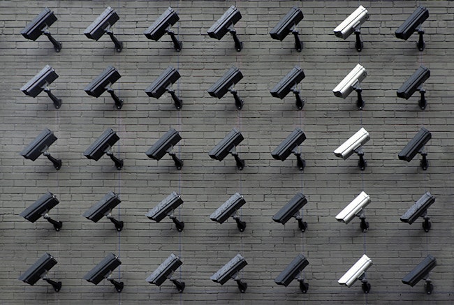 Wall of 1080p Security cameras of various colors all facing in one direction.