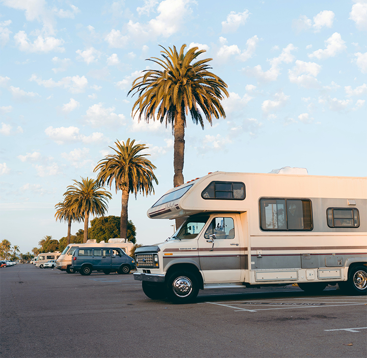 RV with Palm Trees in the background on that would be perfect for a cellular security camera or a wifi one.