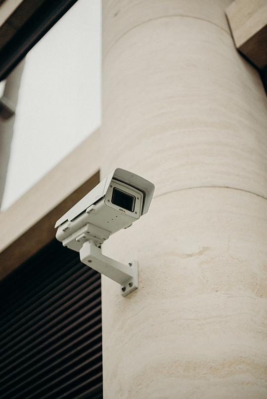 Security Camera Mounted to Pillar Outdoors