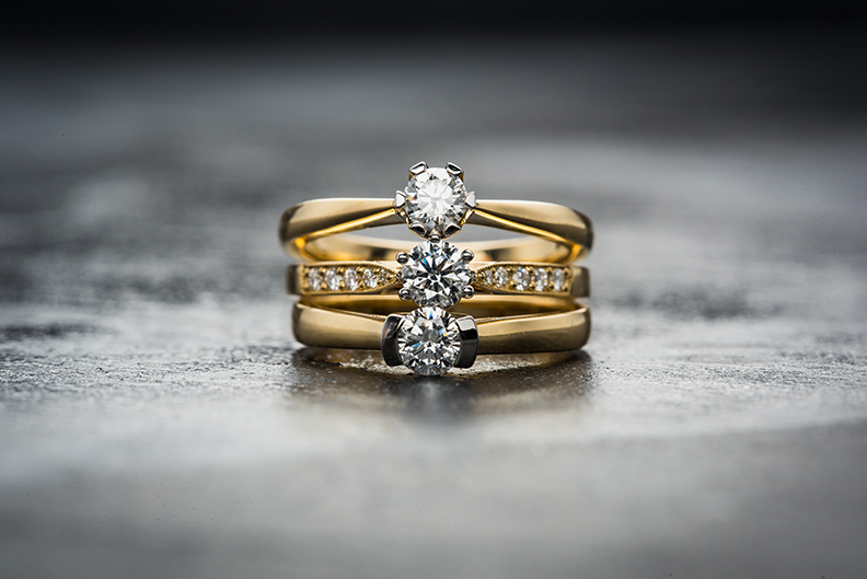 Heirloom ring with diamonds in a gold band ready to be stored in a personal safe.