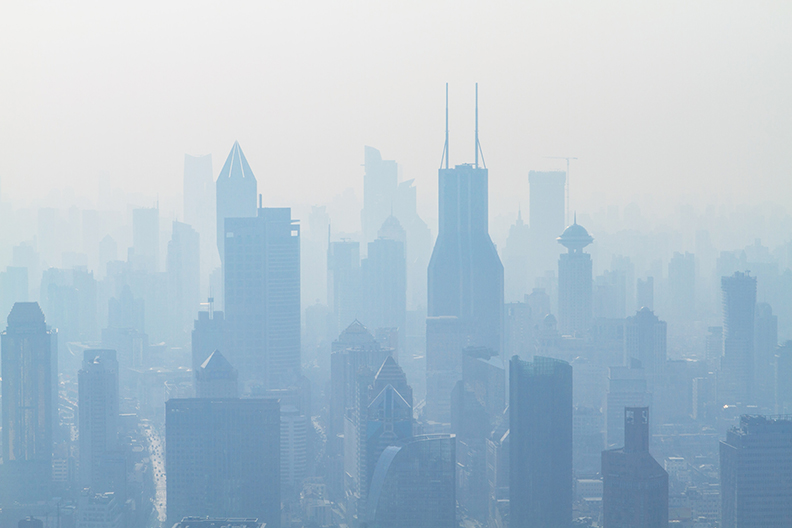 a smogy cityscape. It's important to do air quality testing especially in a polluted city.