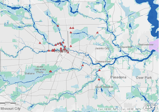Historical Houston Flooding Areas. Red triangles are barricades to minimize flooding.