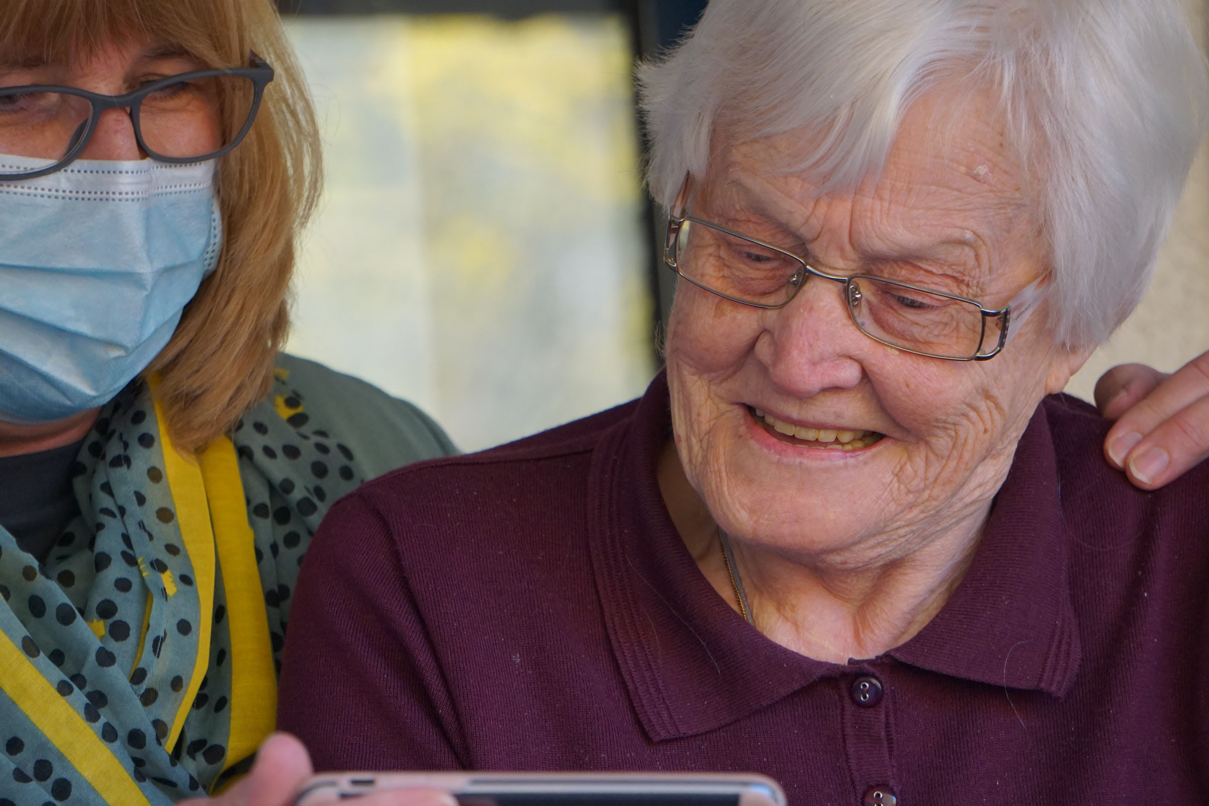 Nurse Helping an elderly woman
