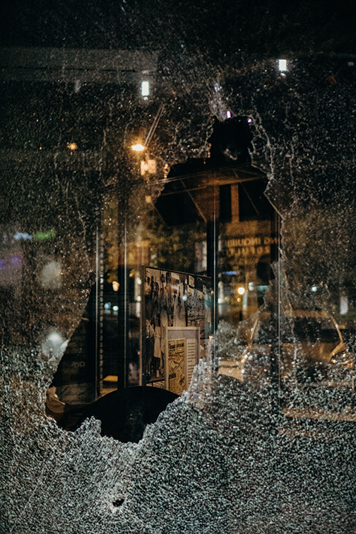 Shattered window representing violent crime