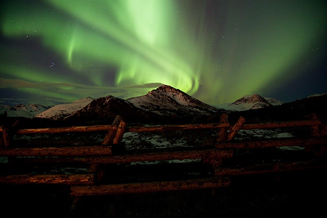 Norther lights over a mountain in Anchorage Alaska
