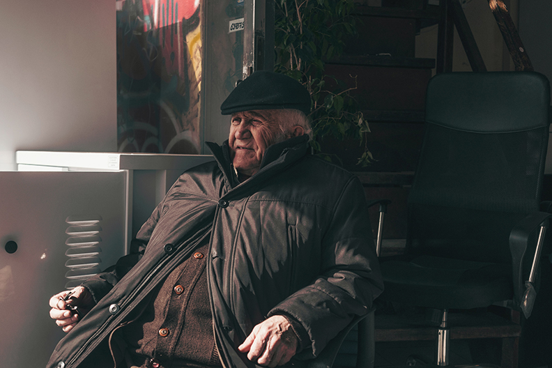 Elderly Man Sitting Alone