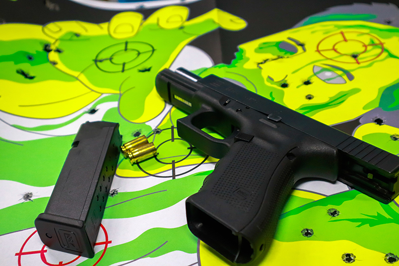 Pistol On Top of Zombie Target