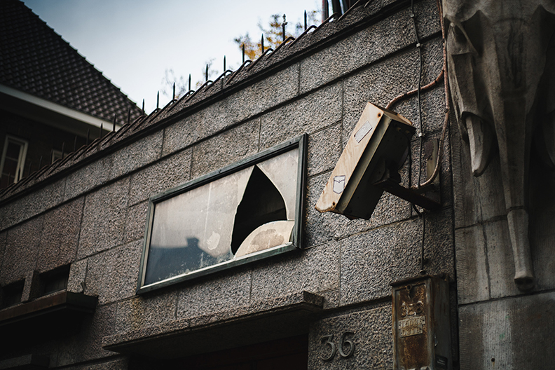 Broken Window and Old Security System