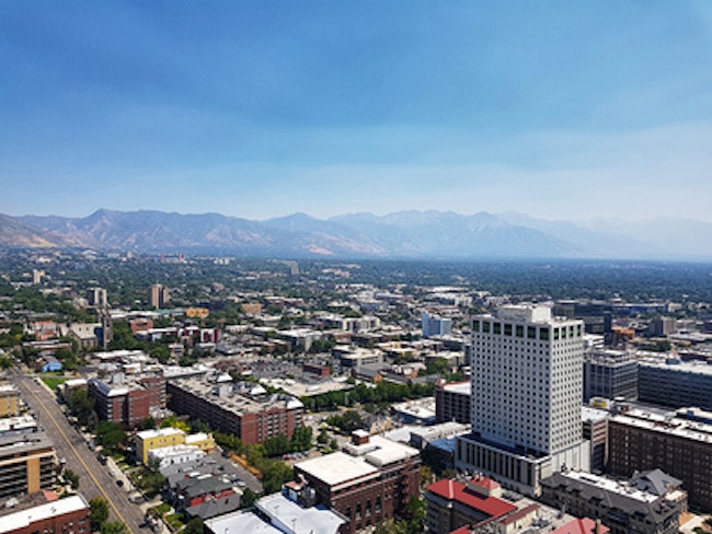 Aerial View of Salt Lake City Utah with a blue sky and light smog