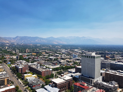 Aerial View of Salt Lake City Utah with a blue sky and light smog