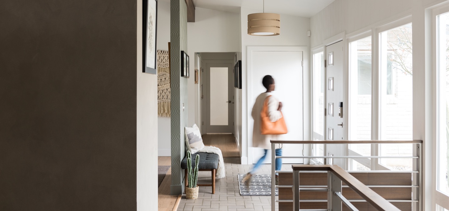 Large background image woman leaving house