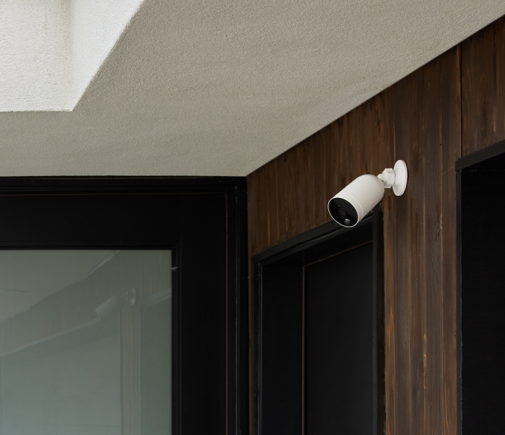 Outdoor camera mounted on wall