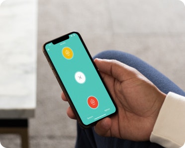 Hand holding smartphone with Cove app