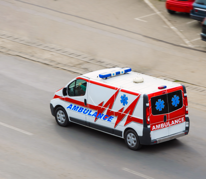 ambulace driving on road