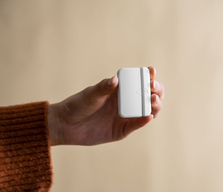 hand holding window sensor