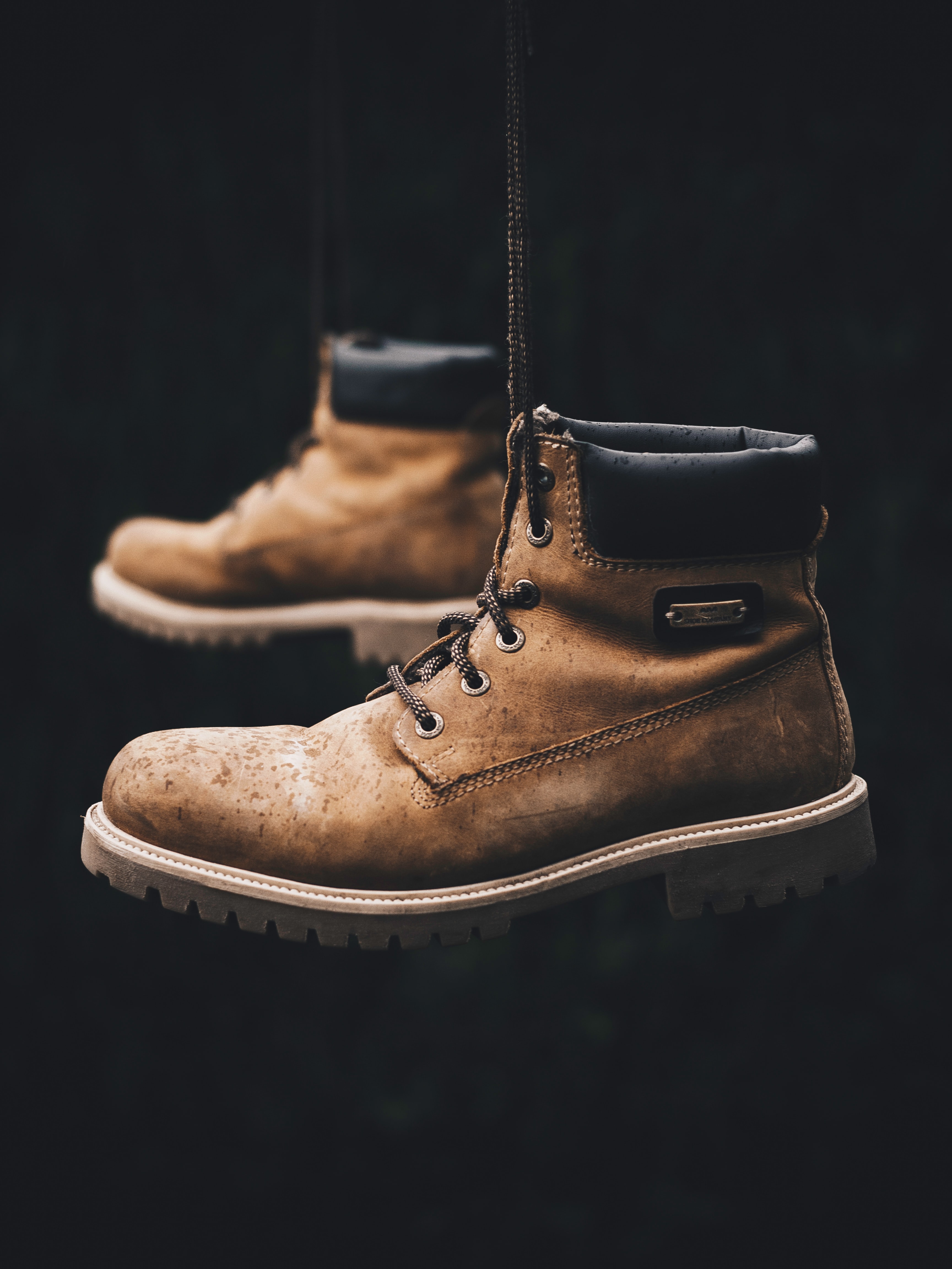 A pair of brown hiking boots.