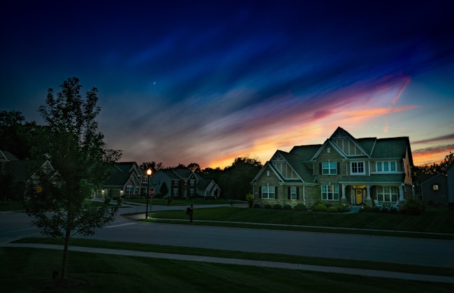 Home without lights on at sunset.