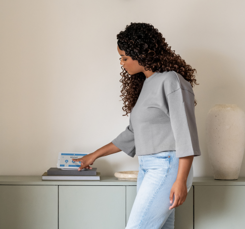 Woman arming alarm panel