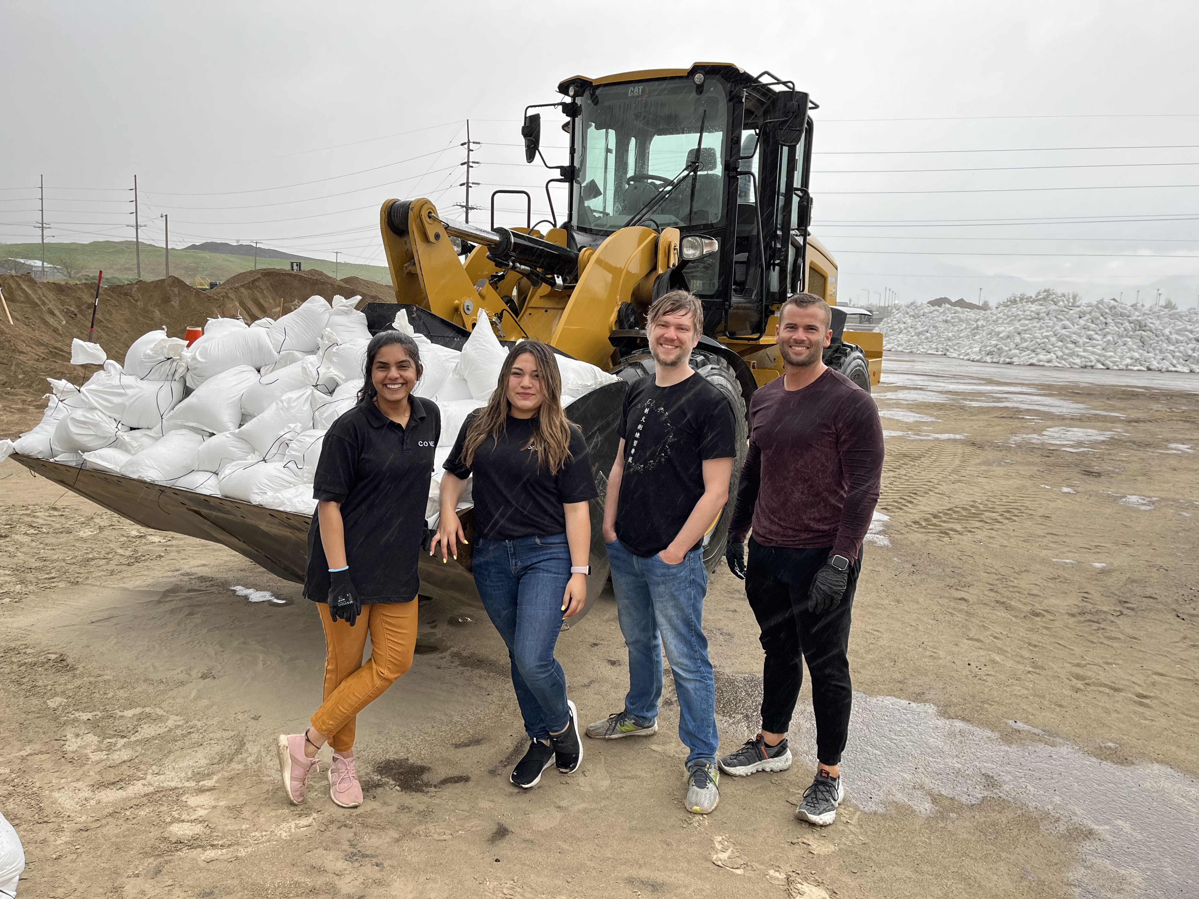 Cove employees volunteer to fill sandbags.