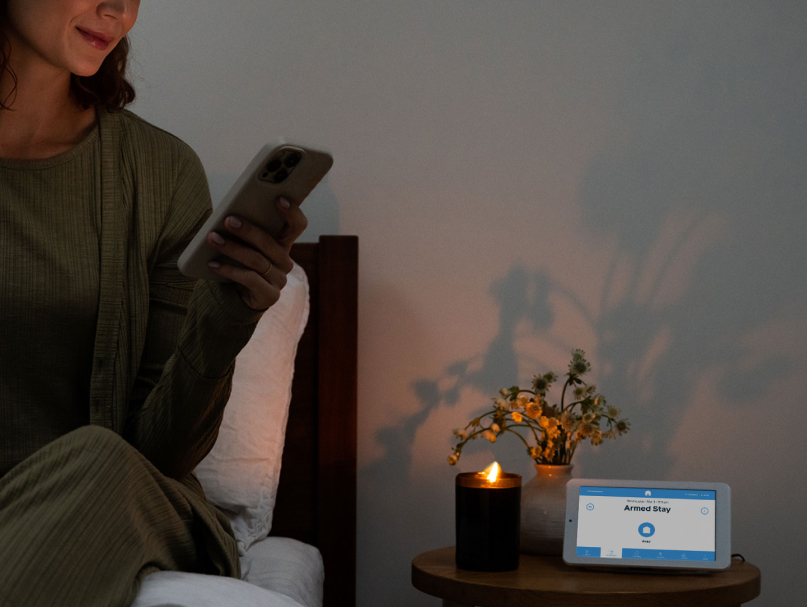 A lady relaxes in the safety of a secured home