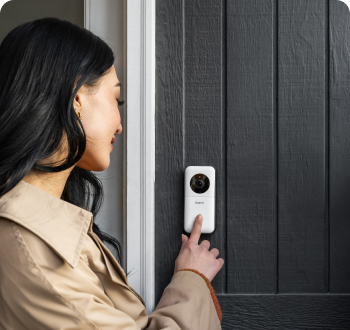 woman using cove doorbell camera