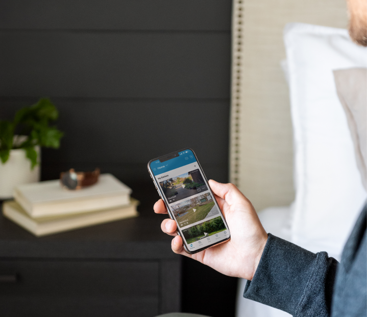 Man holding phone with Cove app open
