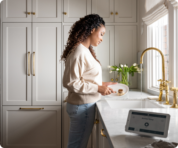 alarm panel on counter near sink