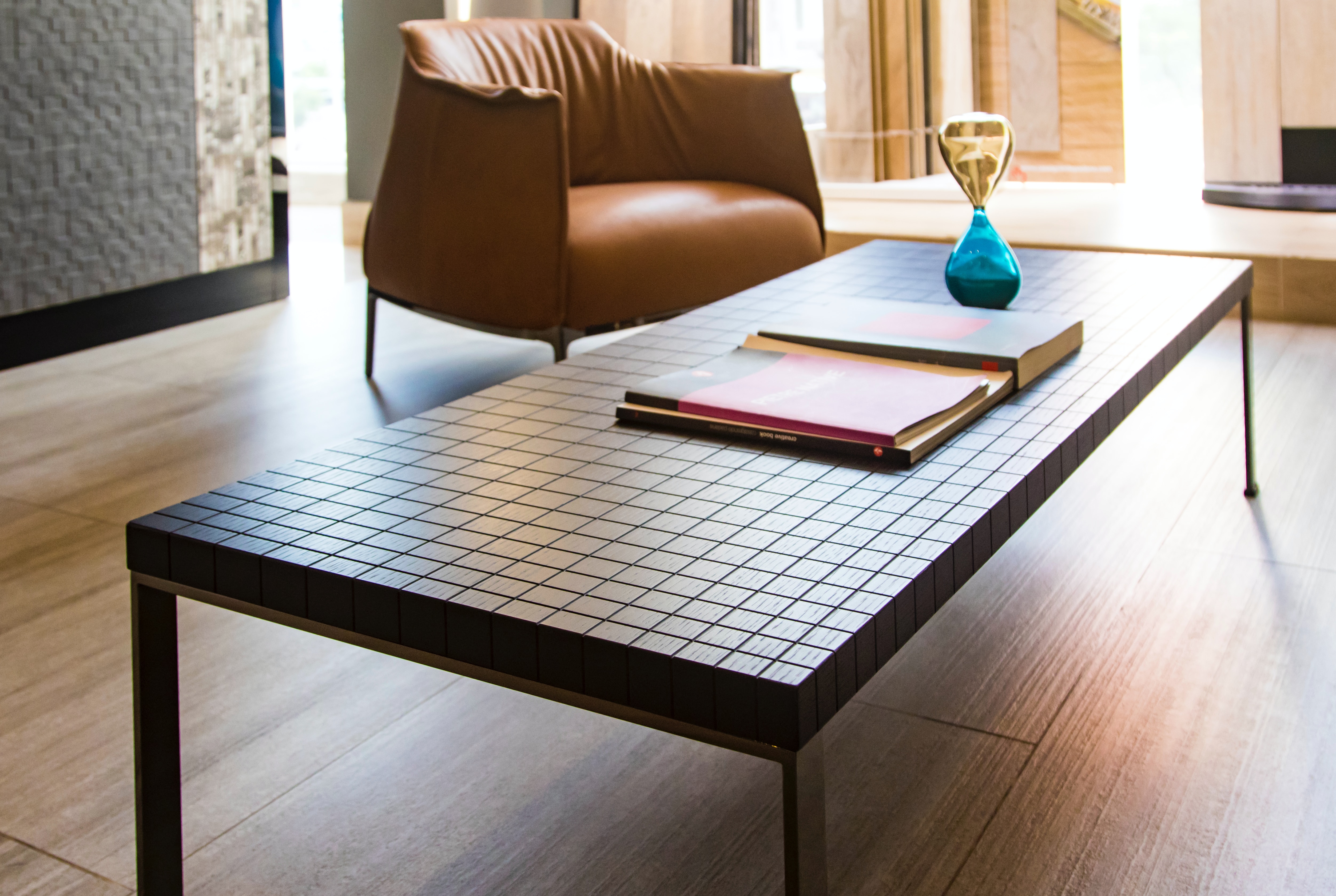 Coffee table at an Airbnb with an instruction binder.