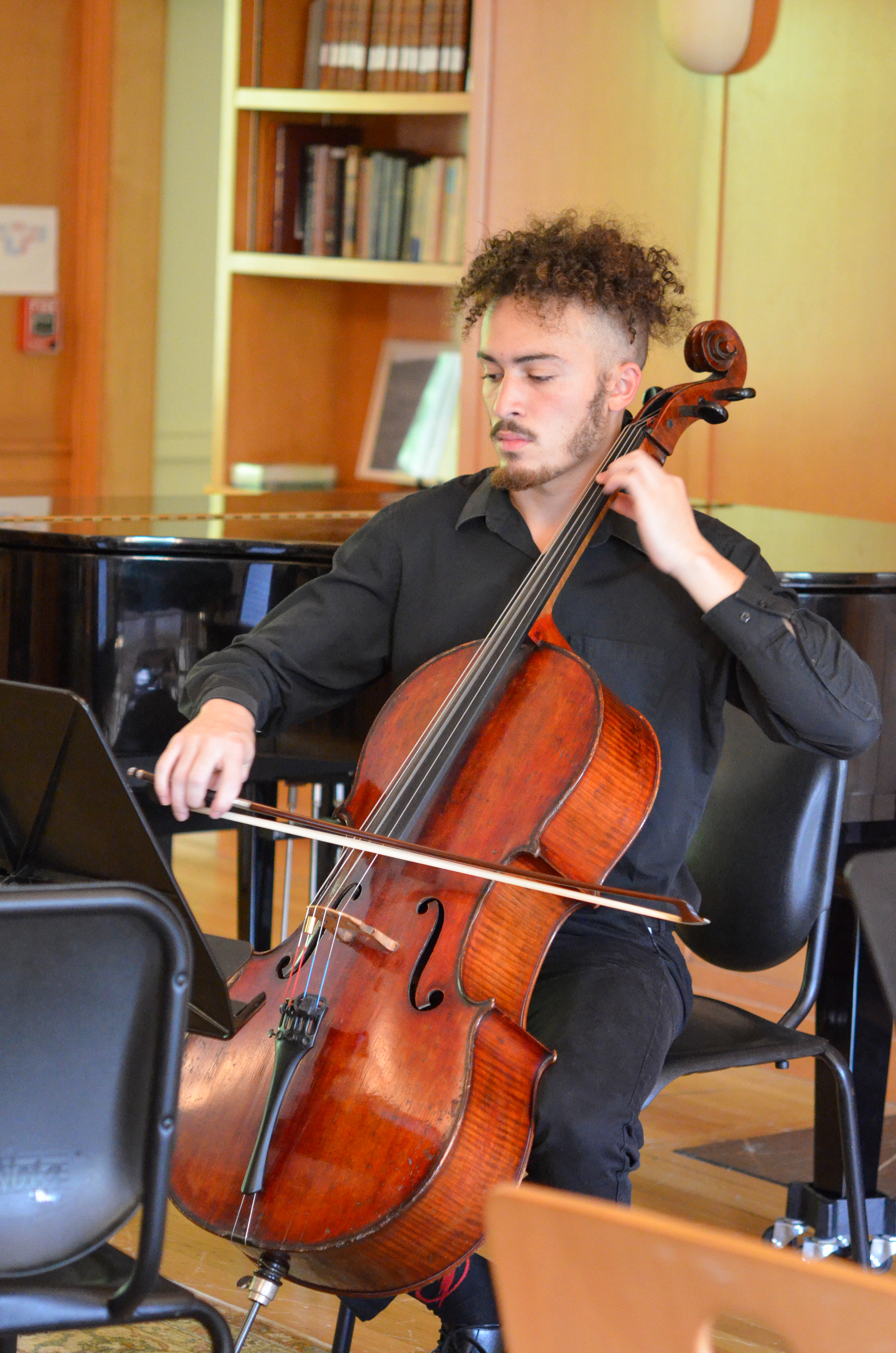 This year's Cove scholarship winner playing the cello as part of his double major.