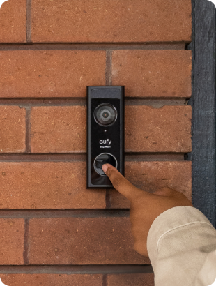 person interacting with eufy doorbell camera