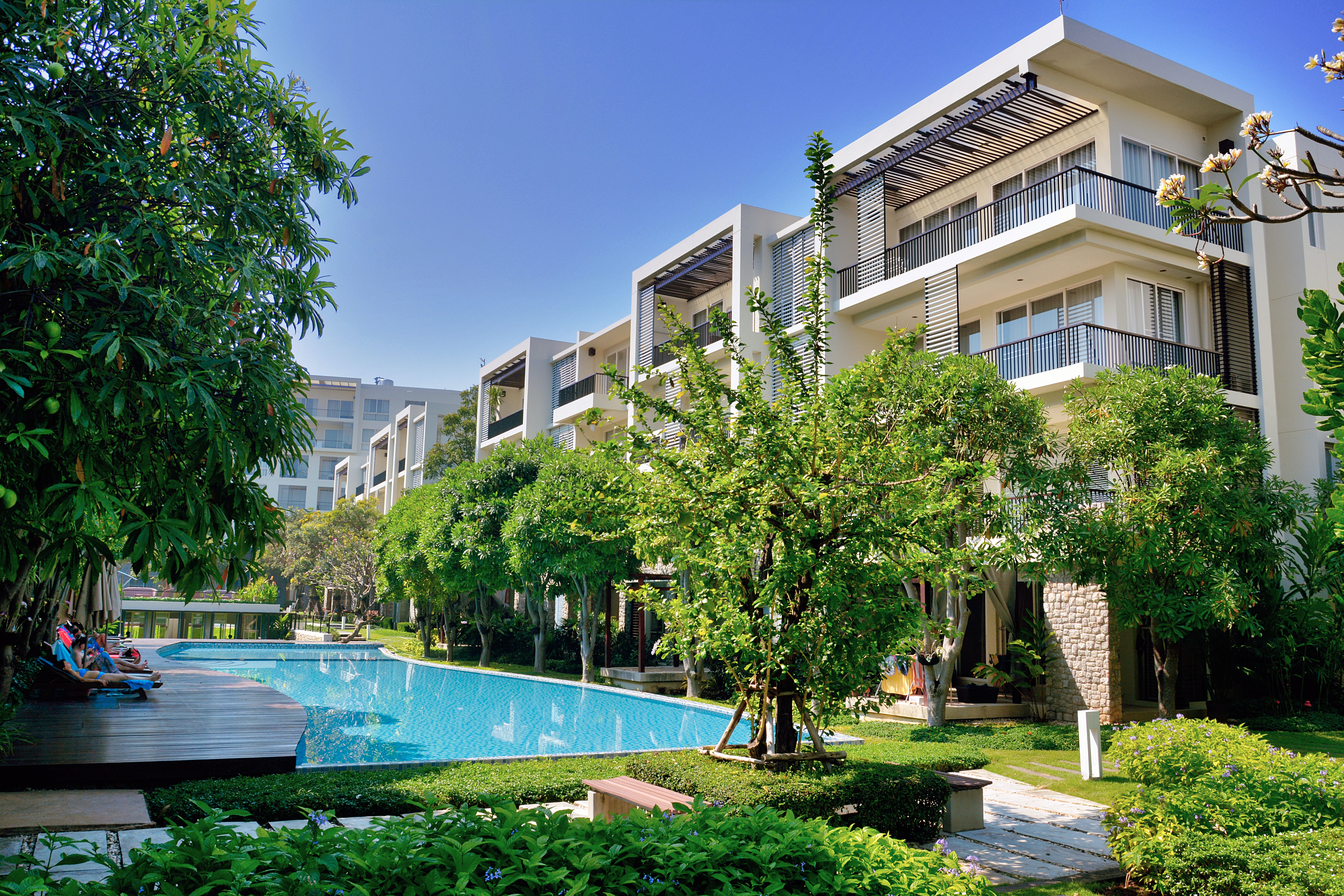 Apartment building with a pool.