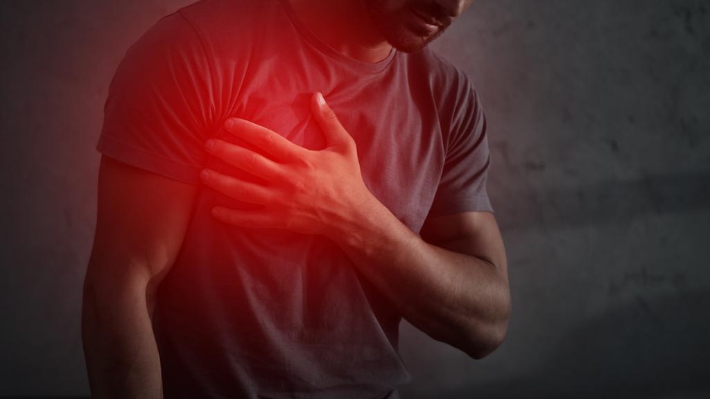 Man experiencing symptoms of a heart attack.