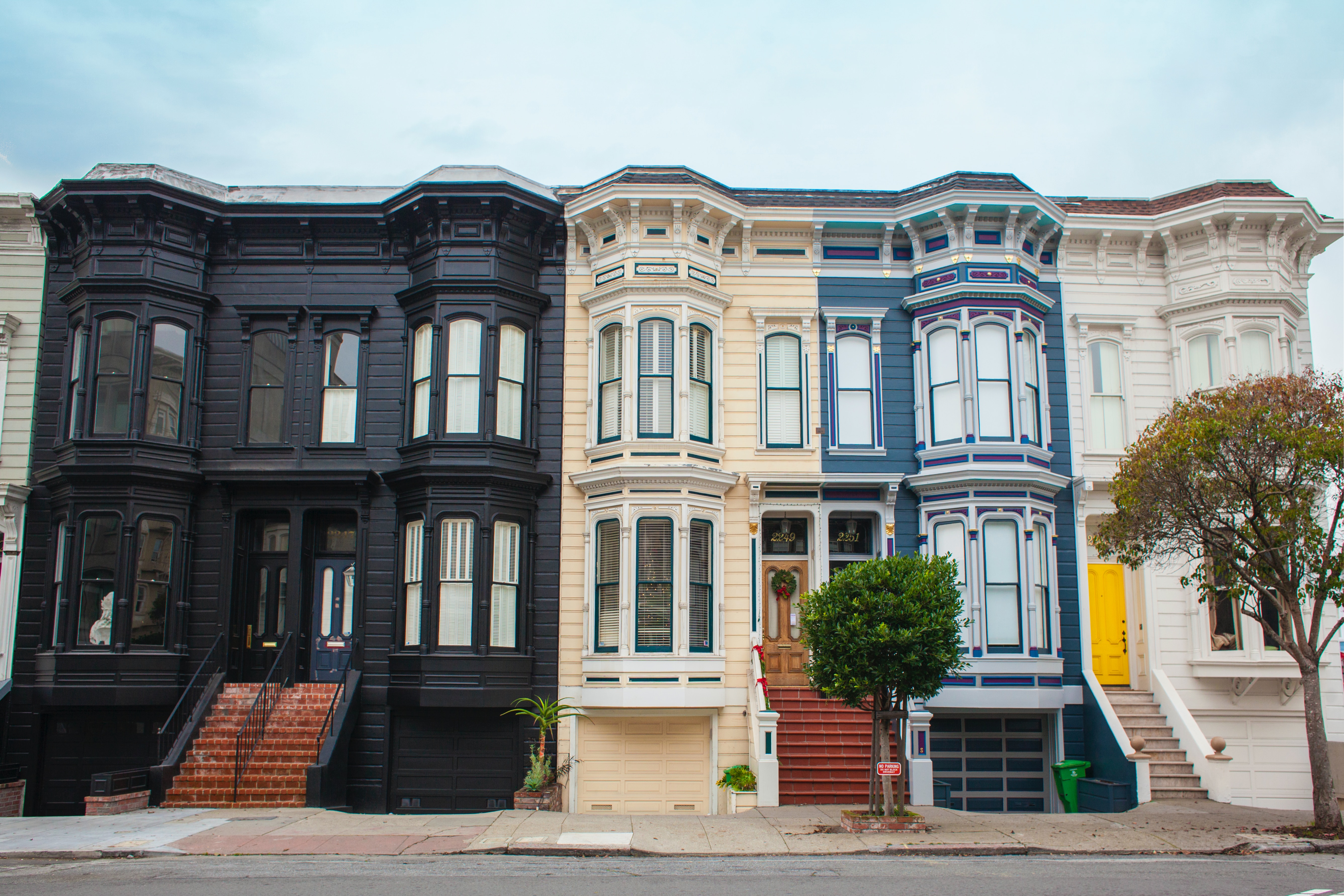 Row houses with front doors unlocked.