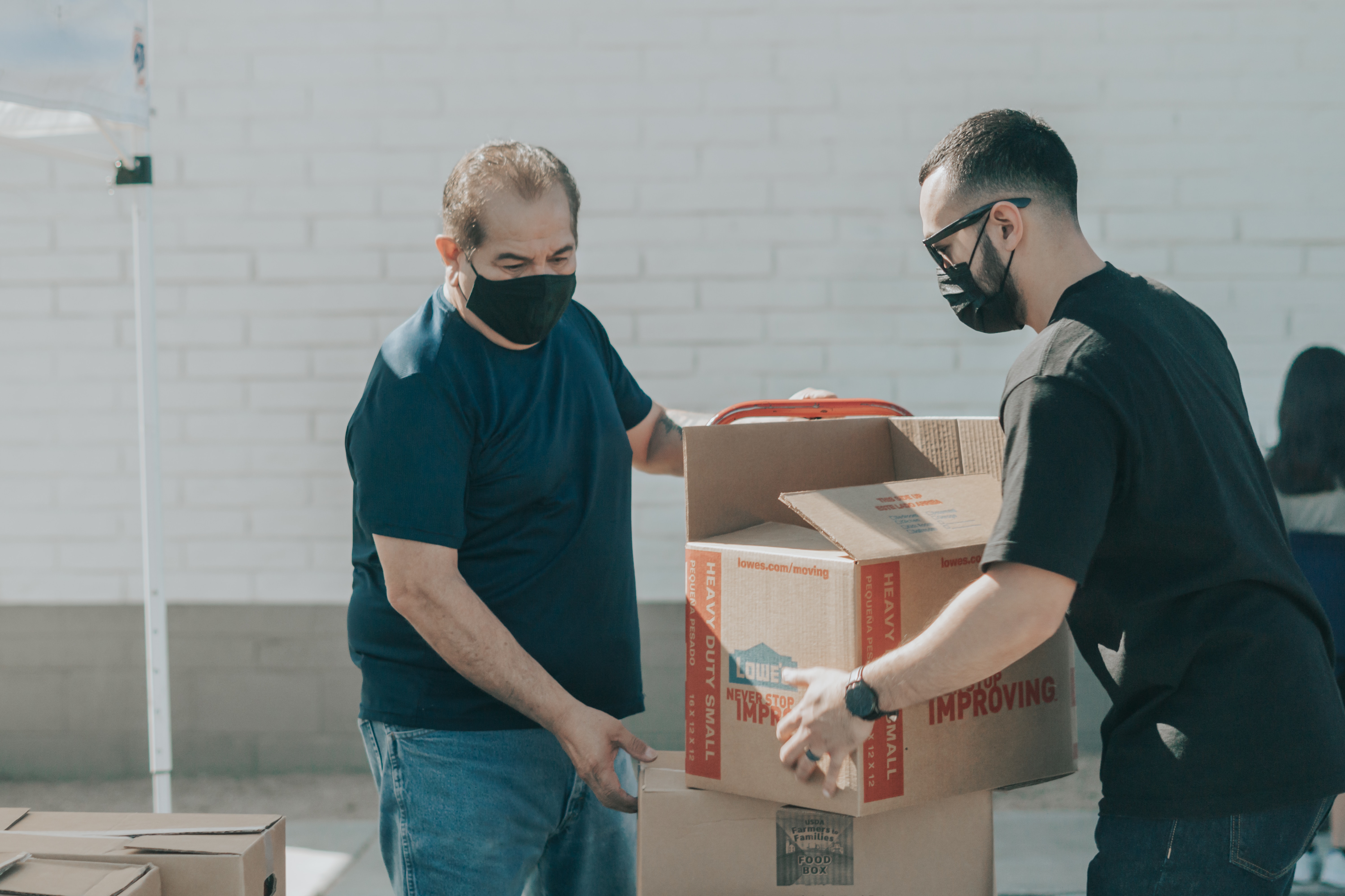 Volunteers helping at a service event.
