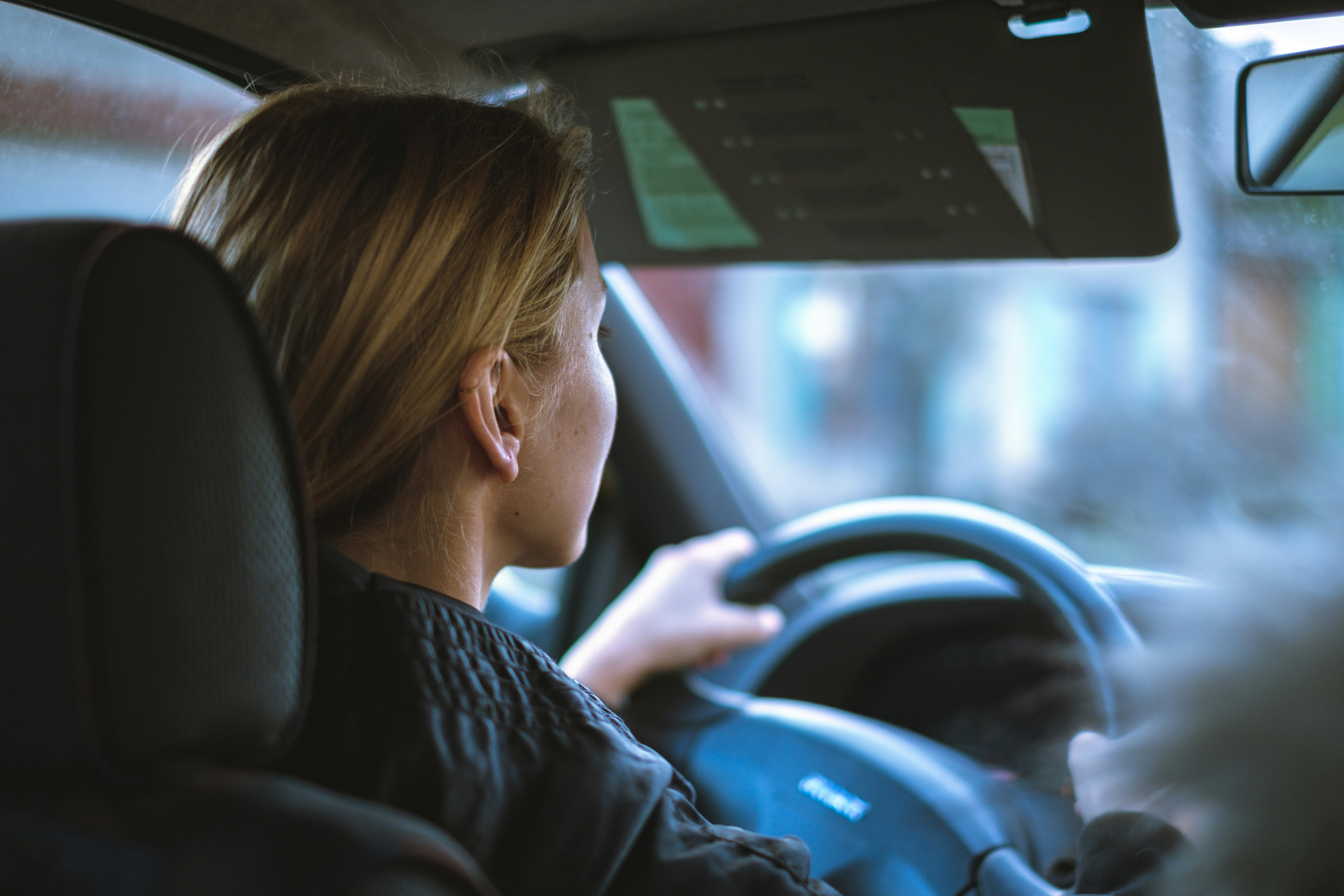 Teen driver behind the wheel of a car.