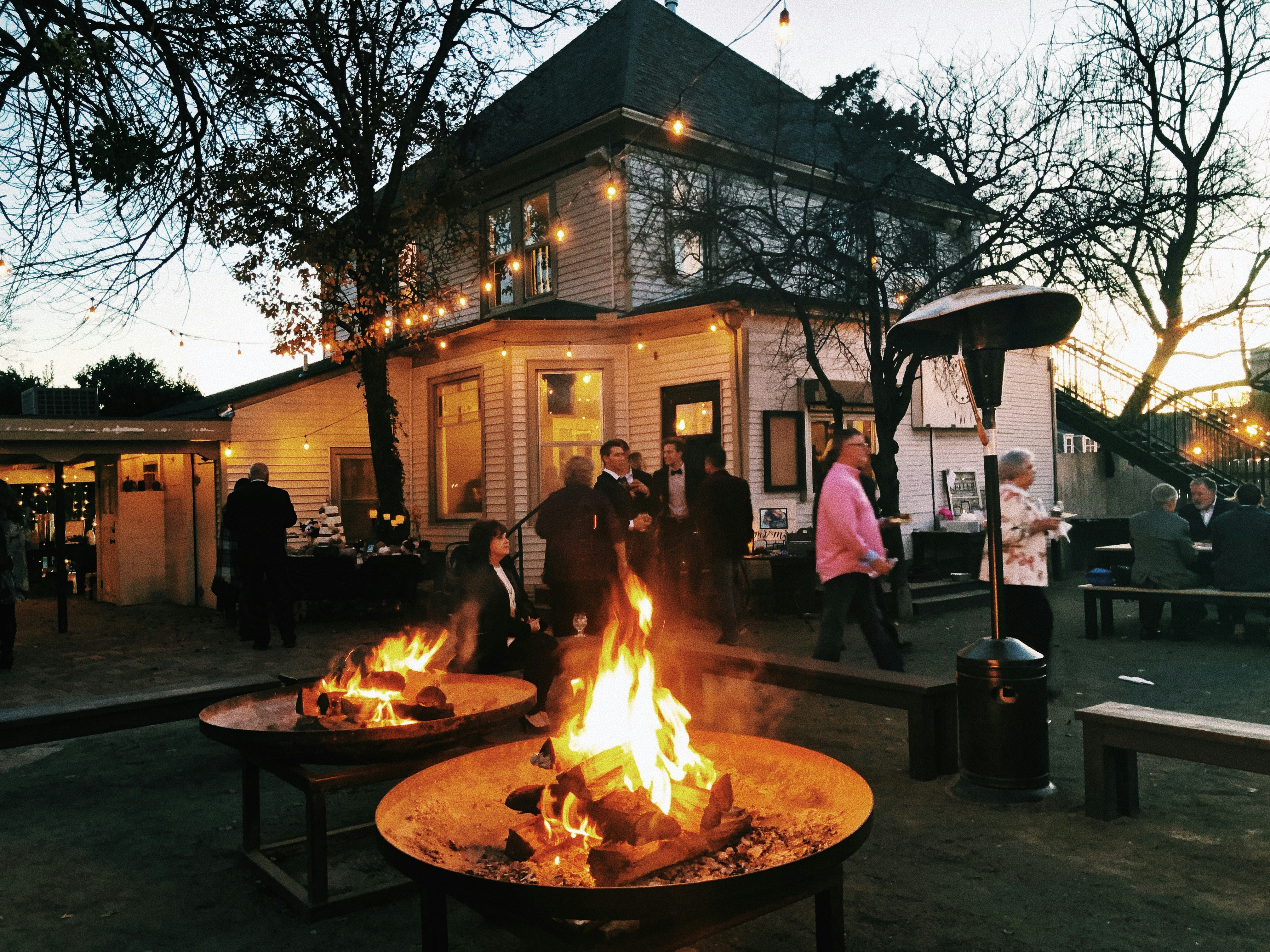 Fire pits in the backyard of a house.