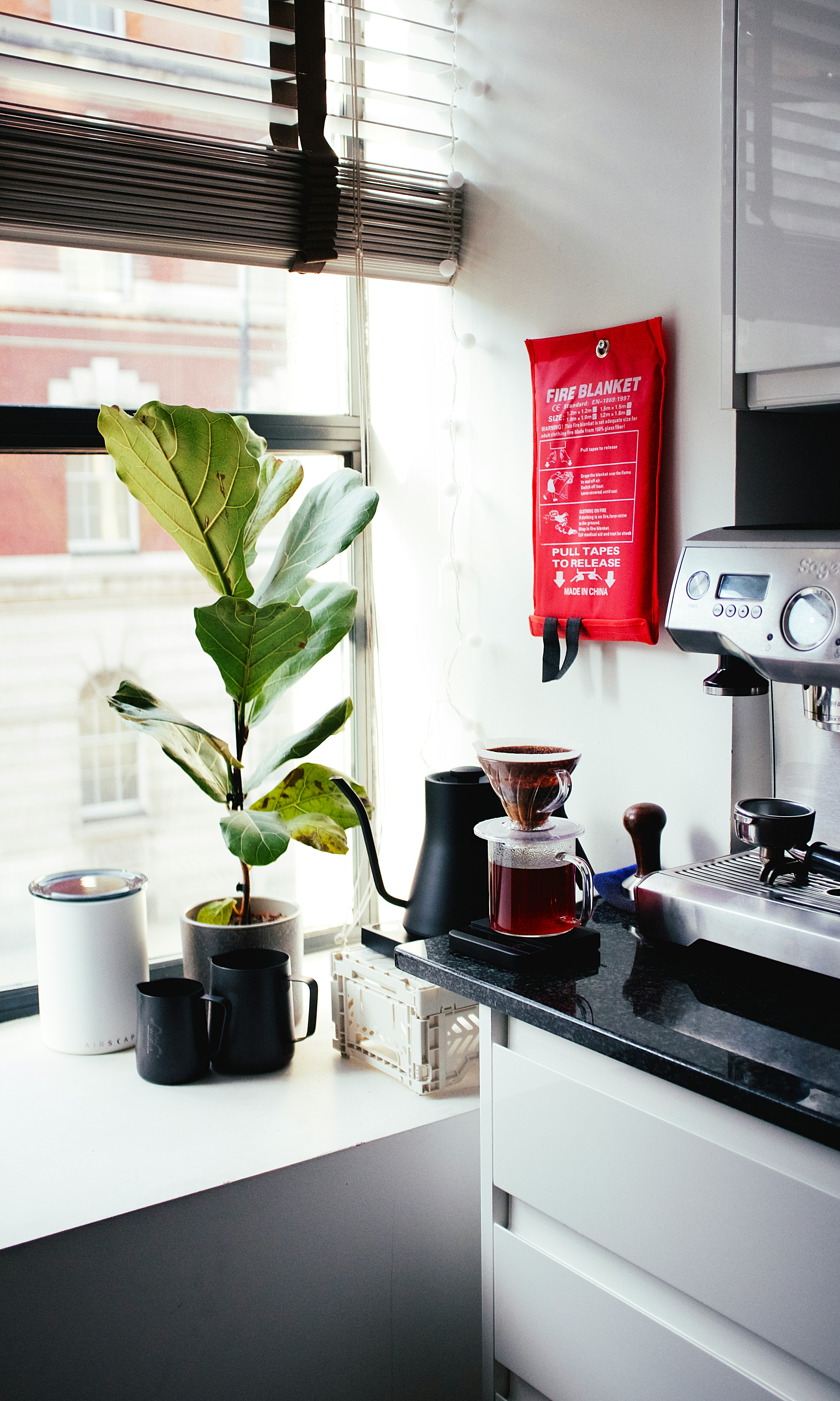 A fire extinguisher in a home kitchen.