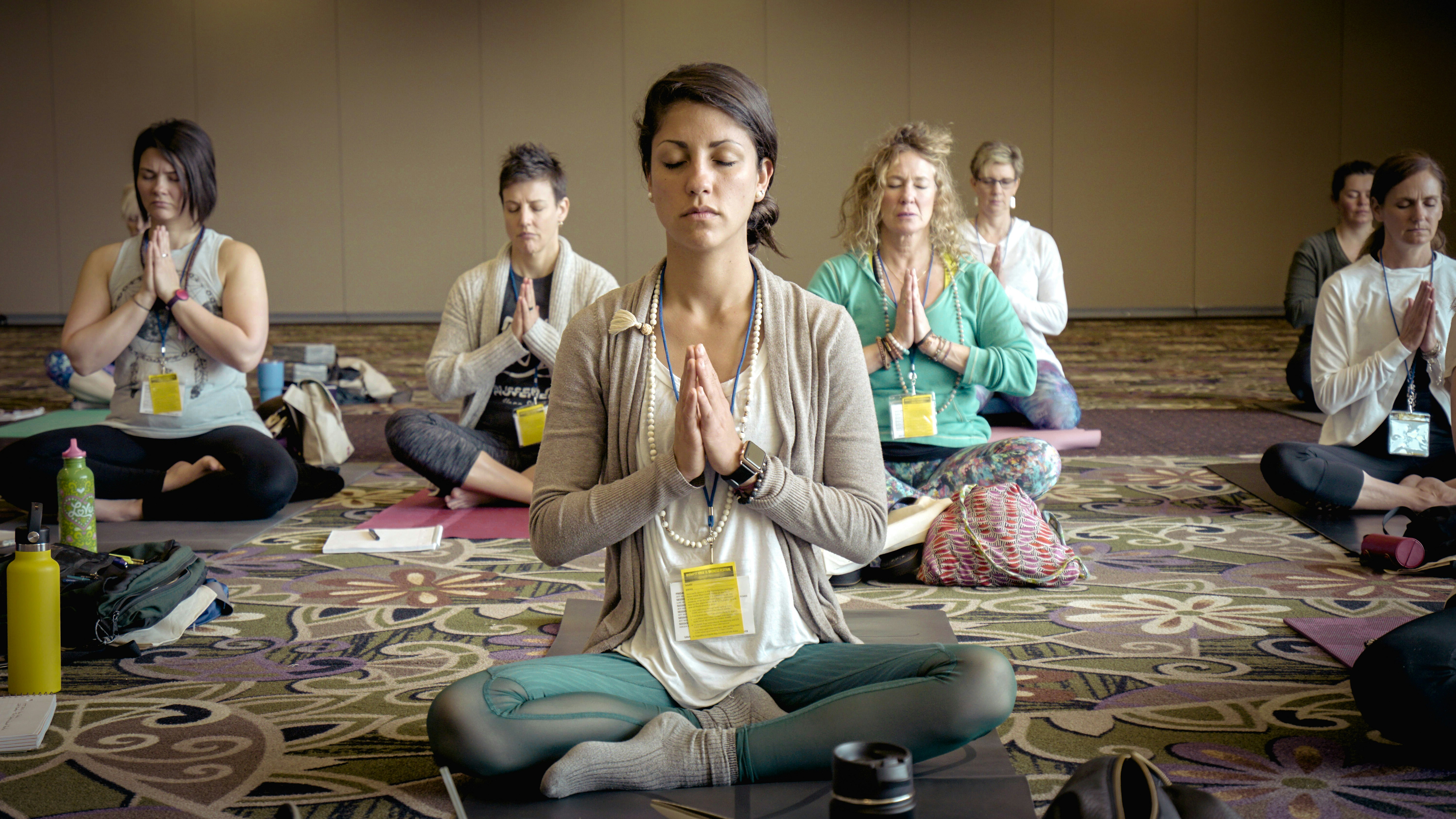 People in a meditation class.