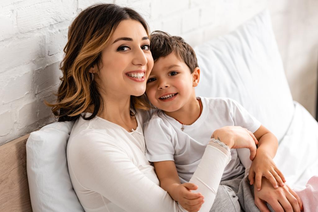 Mom and son getting ready to go to sleep.