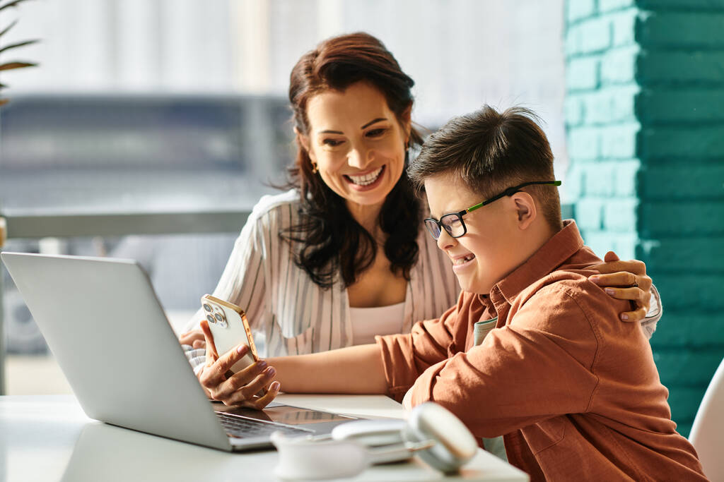 Mother helping her son with special needs.