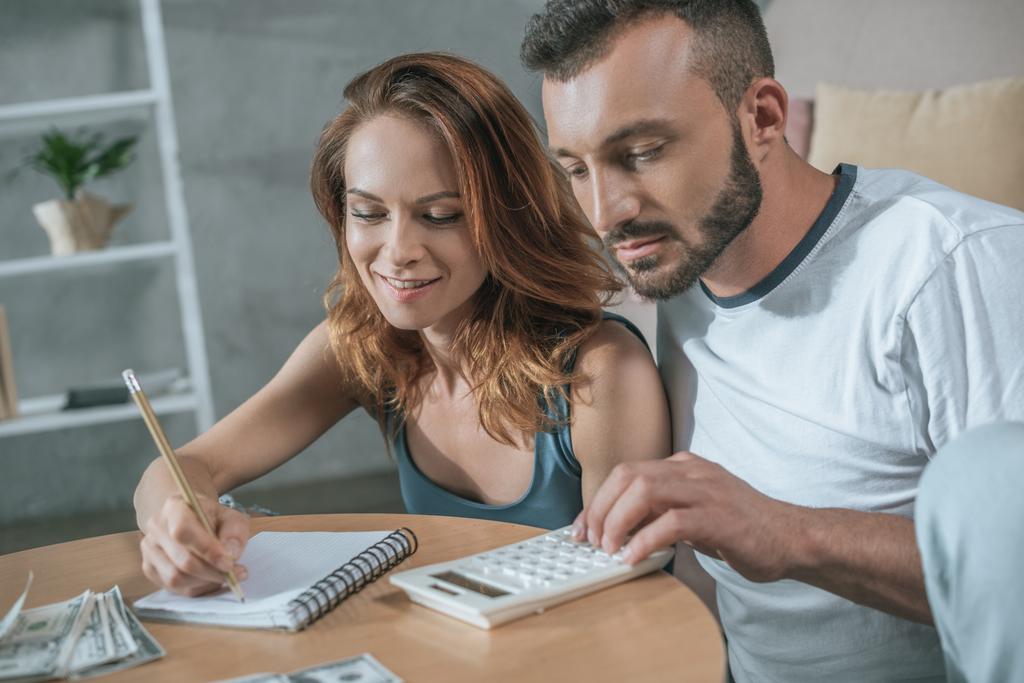 Couple looking at their budget.