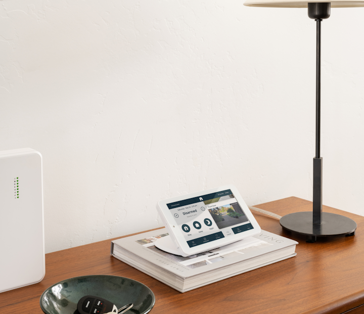 alarm panel and hub on desk